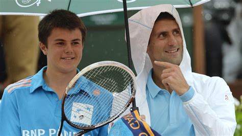 Novak Djokovic Makes A Ball Boys Day During A Rain Delay At The French
