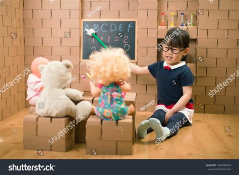 Toddler Girl Pretend Play Teacher Home Stock Photo 1767698999