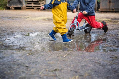 4 Reasons To Let Your Kids Play Outside In Bad Weather Kids In The