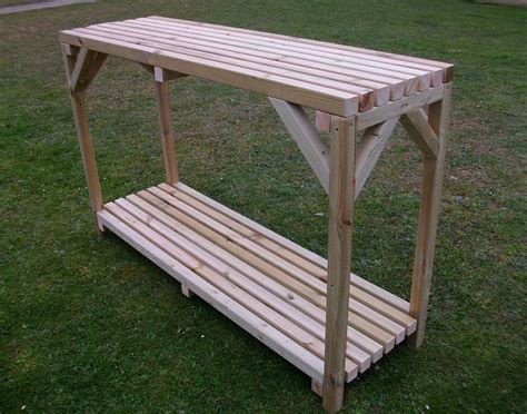 Larger greenhouses or hoop houses/ polytunnels can also make gardening more pleasant for the gardener in inclement weather conditions and chilly temperatures. Wooden Greenhouse Shed Potting Bench / Staging Table with ...