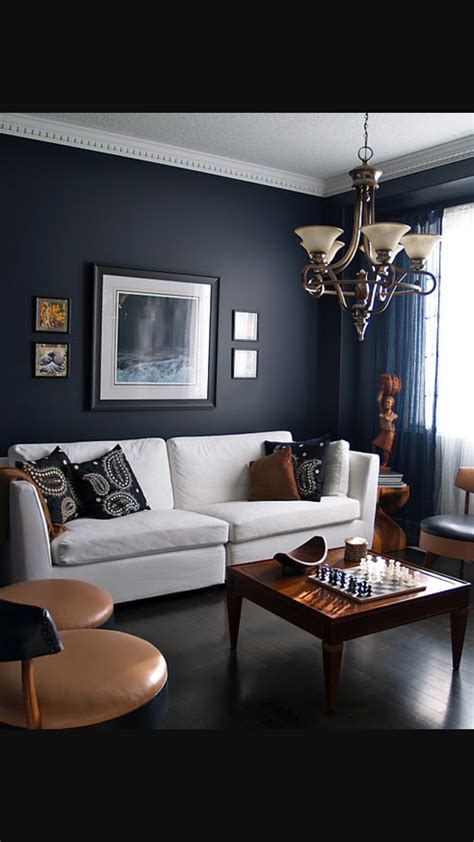 Whether you go for indigo and charcoal or mix in bare wood or glossy white, there are various ways to. Navy walls, living room | Dark living rooms, Navy living rooms, Navy blue living room