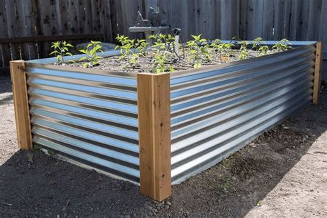 First, those who have carpentry skills and the required tools can save on overall costs. Build Your Own Corrugated Metal Raised Bed | The garden!