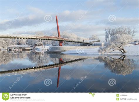 Beautiful Winter Landscape With Footbridge And Nice Reflection In Water