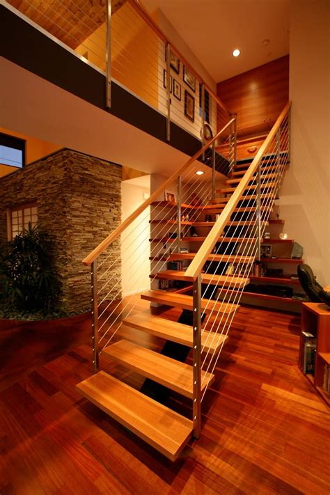 The Staircase Between Levels Seems To Hover In The Air Thanks To Its