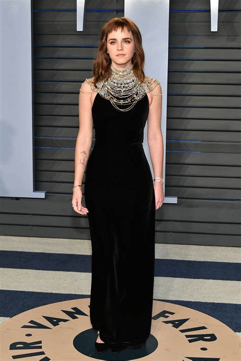 The perks of being a wallflower. Emma Watson looked great but her tattoo didn't at the VF Oscar party