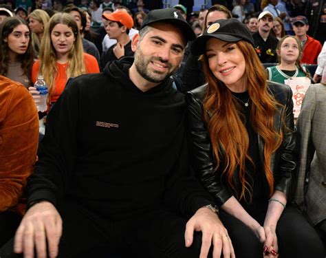 Lindsay Lohan And Husband Bader Shammas Smile As They Sit Courtside At