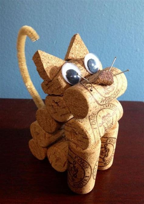 A Cat Made Out Of Wine Corks Sitting On Top Of A Table