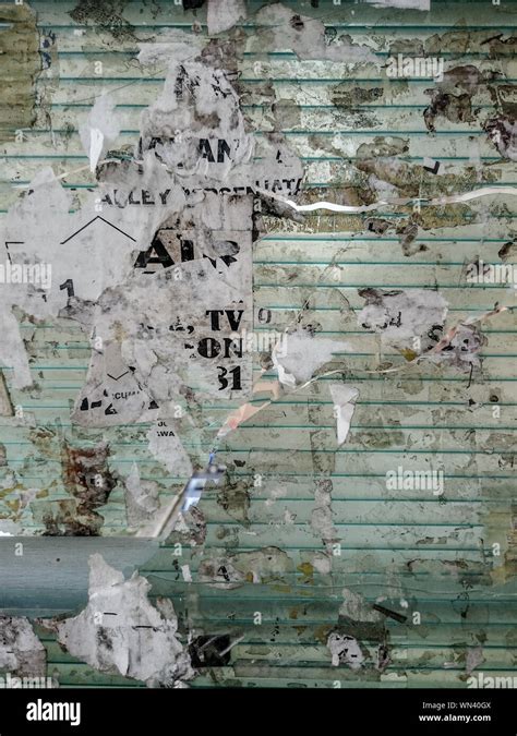 Torn Posters On Brick Hi Res Stock Photography And Images Alamy