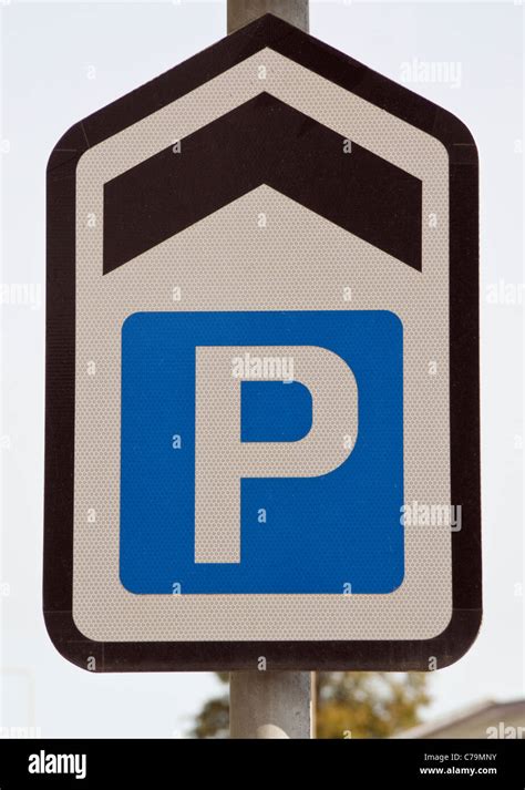 Blue And White Parking Direction Sign For A Car Park Straight Ahead Uk