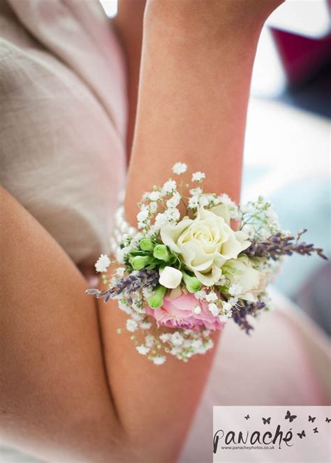 This Wrist Corsage Was Created On Ivory Ribbon With Lavender