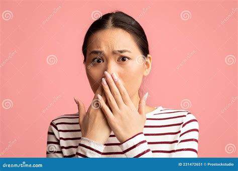 oh no portrait of shocked asian woman covering mouth with hands stock image image of secrecy