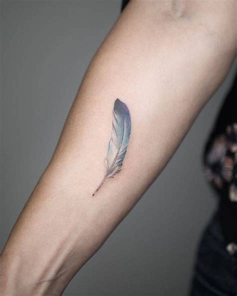 small feather tattoo on arm small feather tattoo small tattoos momcanvas