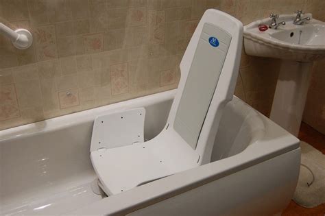 Transfer bench is a showering bench that helps handicapped people to get into a bathtub. Bathtub Lift: How to Install for Home Use | Bathroom ...