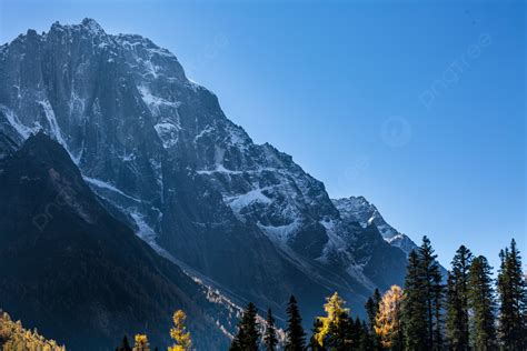 Snow Capped Mountains On The Western Sichuan Plateau In Autumn
