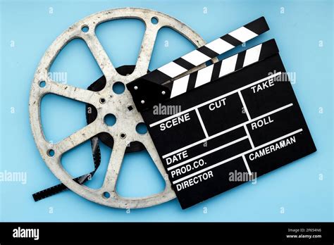 Movie Film Reel With Clapperboard Cinema Concept Stock Photo Alamy