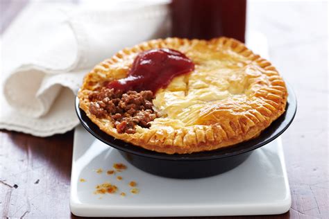 A Pie Sitting On Top Of A White Plate