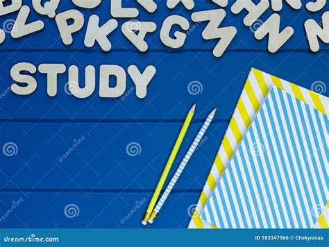 Wooden Letters On Classic Blue Background Title Study On The Table