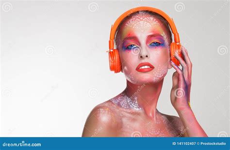 Bright Beautiful Woman Dj In Orange Headphones Stock Image Image Of Bright Colorful 141102407