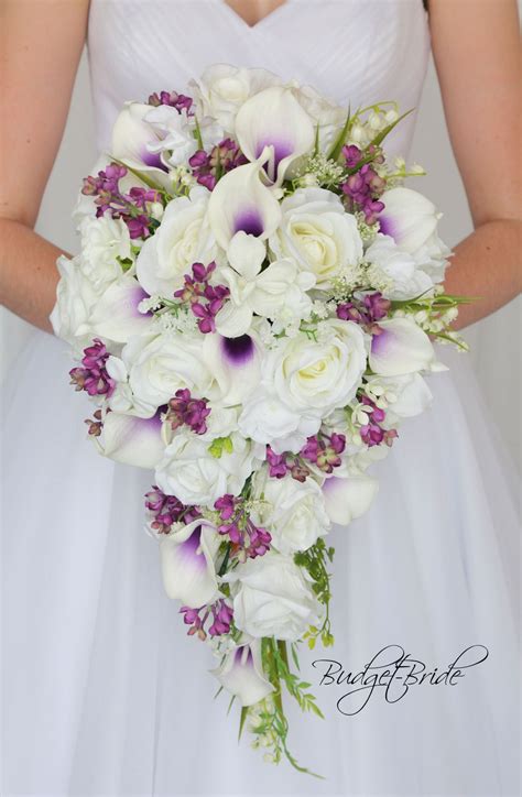 This Stunning Brides Bouquet Is A Cascading Bouquet Made With Ivory