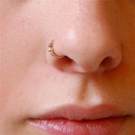 20 Eye Catching Hoop Nose Piercing Pictures Sheideas