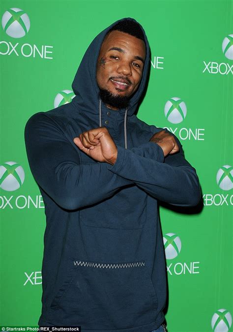 rapper the game surrenders to police after throwing a punch at an officer daily mail online