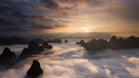 Sunrise Over The Clouds With Karst Formation Mountains In Guilin