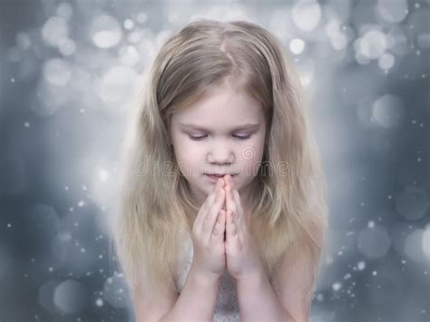 Little Girl Praying With Eyes Closed Stock Photo Image Of Catholic