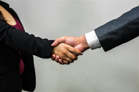 handshake man and woman white businesswoman shakes hands… flickr