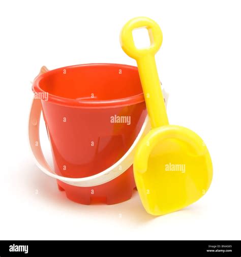 Kids Red Bucket And Yellow Spade Summer Holiday Concept Isolated