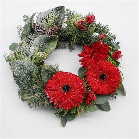 Christmas Wreath With Fresh Greenery And Flowers