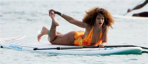 rihanna paddle boating in a swimsuit in barbados august 2015 celebmafia