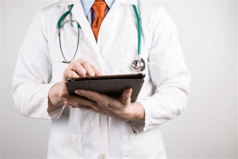 Doctor With Tablet Free Stock Photo Public Domain Pictures