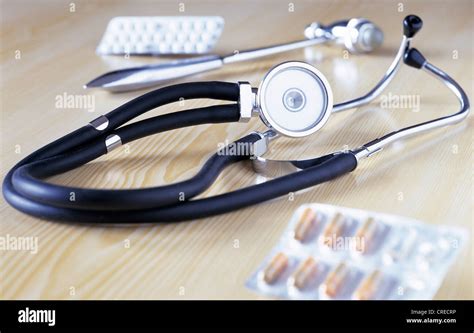 Stethoscope Reflex Hammer And Drugs On A Table Stock Photo Alamy