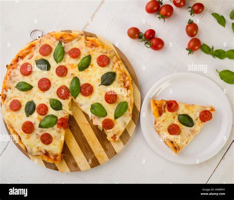 Classic Pizza Margherita Slice On White Plate Stock Photo Alamy