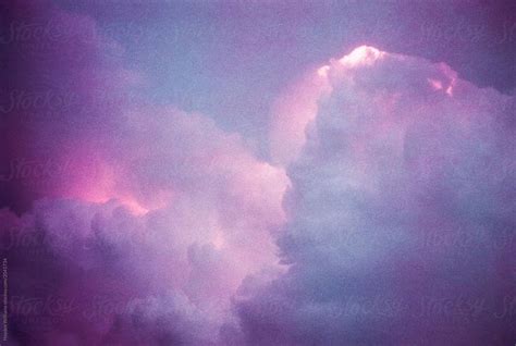 Surreal Purple Sunset Sky Filled With Clouds By Stocksy Contributor