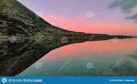 Fascinating Landscape Of A Lake And Mountains At Sunset Stock Image
