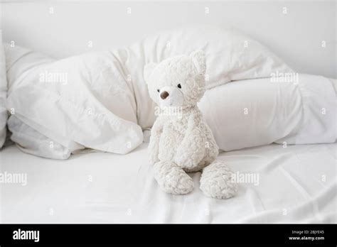 Teddy Bear On Bed Stock Photo Alamy