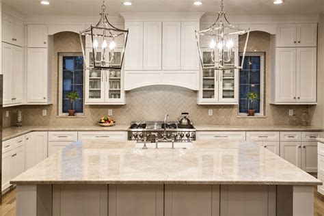 Freestanding credenza is fashioned in gunmetal gray aluminum and topped with taj mahal polished quartzite. Taj Mahal Kitchen Countertops. Designed by Kate.