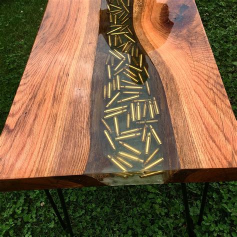 Table design with bullet. #epoxytable #epoxyresin #table #resin #epoxy