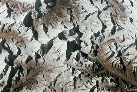 Mountain Range On Earth Viewed From Space Photograph By Stockbyte