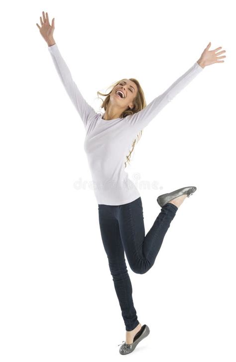 Fit Woman With Arms Raised Doing Stretching Exercise Stock Photo
