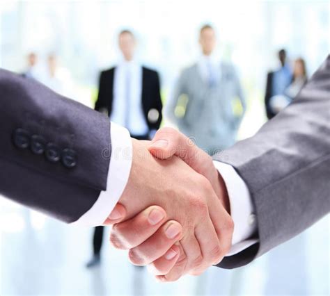 Closeup Of A Business Handshake Business People Shaking Hands Stock