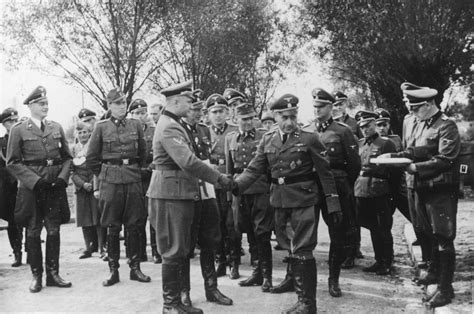 Nazi Officers Watch Commandant Richard Baer Shakes Hands With Karl
