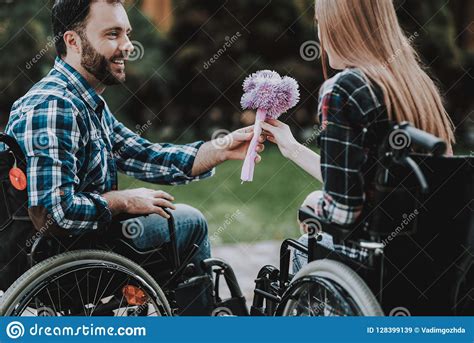 Couple Of Disabled People On Wheelchairs On Date Stock Image Image