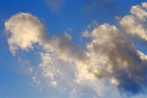 Brilliant Blue Sky With White And Black Clouds Picture Free