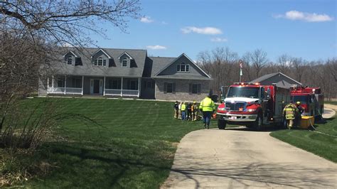 Fire Officials Respond To A House Fire In Bath Township