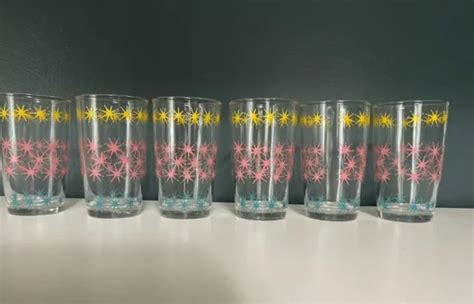Vintage Hazel Atlas Atomic Starburst Yellow Pink Blue Juice Glasses Set