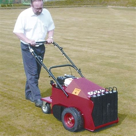 Aeration, mowing & scarifying equipment available to buy online. Petrol Lawn Aerator | Purple Hire Solutions