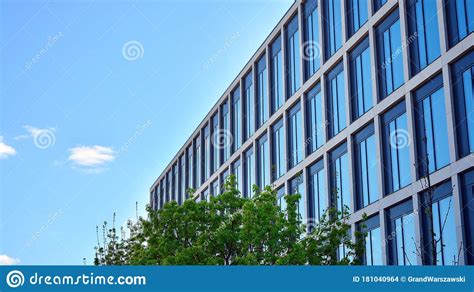 Modern Office Building Windows With Vertical Lines And Reflection