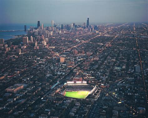 Wrigley Field And Chicago Skyline Cubs At Night Chicago Cubs Framed Print